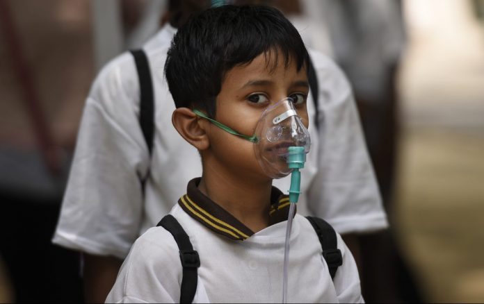 Boy-mask-Delhi-PTI-e1533041126679